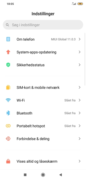 Vælg Om telefon