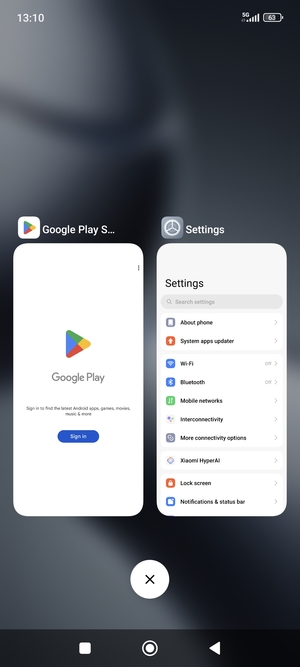 Select the Delete icon to close all running apps