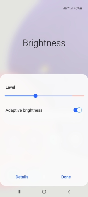Turn on Adaptive brightness and select Done