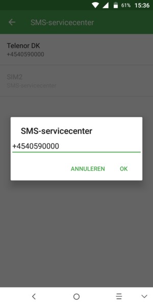 Voer het SMS-servicecenter nummer in en selecteer OK