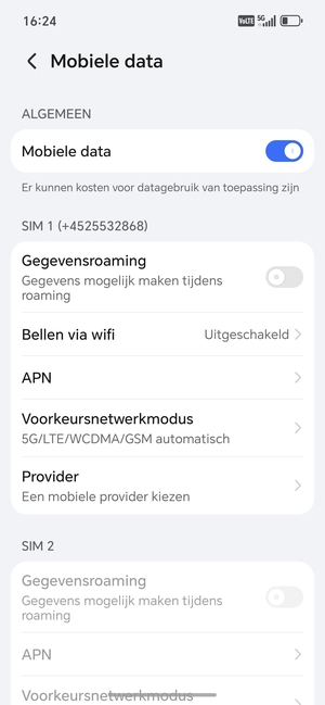 Scroll naar SIM 1 of SIM 2 en selecteer APN