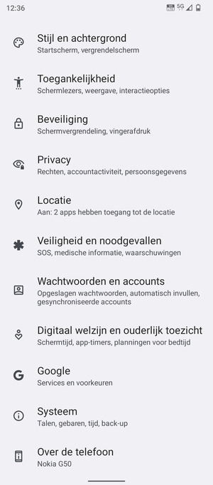 Scroll naar en selecteer Wachtworden en accounts