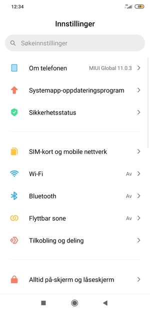 Velg Om telefonen