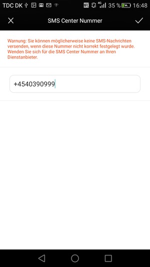 Geben Sie die SMS Center Nummer ein und wählen Sie OK