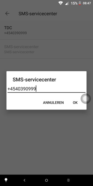 Voer het SMS-servicecenter nummer in en selecteer OK