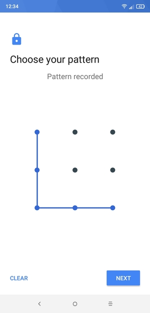 Draw an unlock pattern and select NEXT
