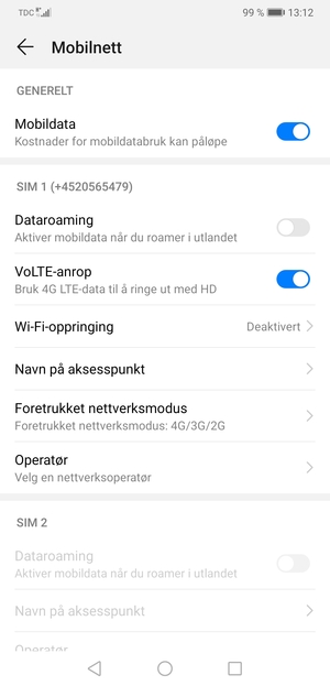 Bla til SIM 1 eller SIM 2 og velg Navn på aksesspunkt