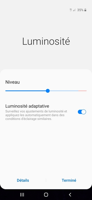 Activez l'Luminosité adaptative et sélectionnez Terminé