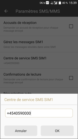 Saisissez le numéro du Centre de service SMS SIM et sélectionnez OK