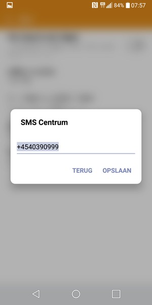 Voer het SMS Centrum nummer in en selecteer OPSLAAN