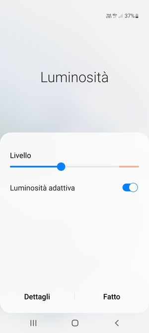 Attiva Luminosità adattiva e seleziona Fatto