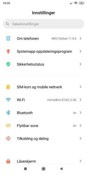 Bla til og velg Om telefonen
