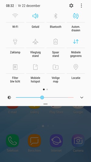 Selecteer de v knop