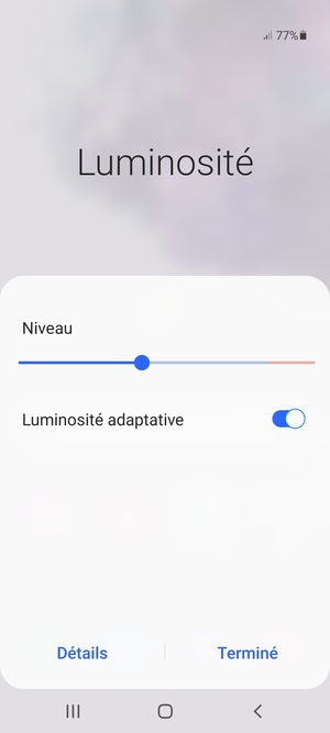 Activez l'Luminosité adaptative et sélectionnez Terminé