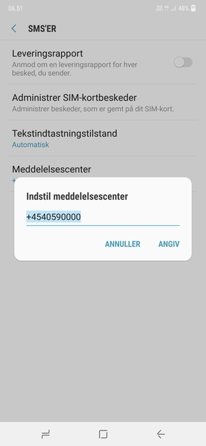 Indtast Meddelelsescenter nummeret og vælg ANGIV
