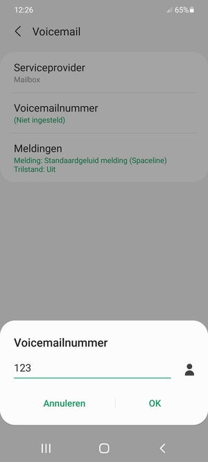 Voer het Voicemailnummer in en selecteer OK