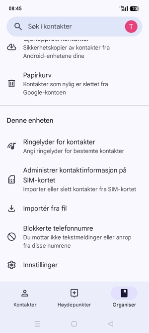 Bla til og velg Administrer kontakinformasjon på SIM-kortet