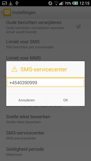 Voer het SMS-servicecenter nummer in en selecteer OK