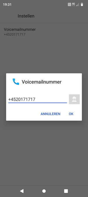 Voer het Voicemailnummer in en selecteer OK