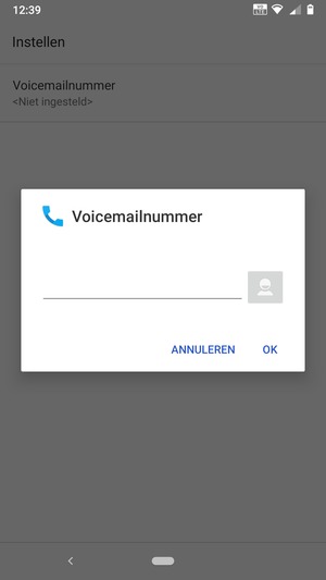 Voer het Voicemailnummer in en selecteer OK