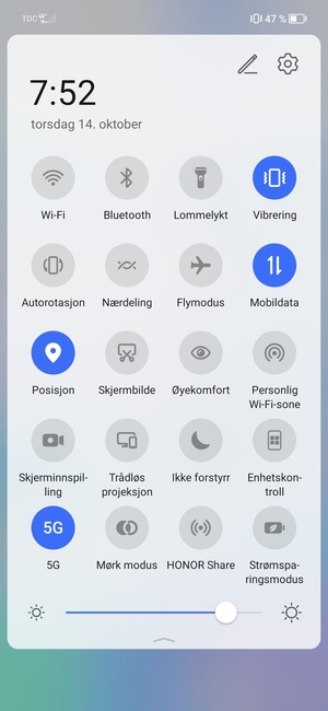 Velg Vibrering for å bytte til lydløs