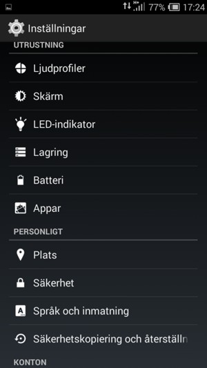 Scrolla till och välj Säkerhetskopiering & återställning