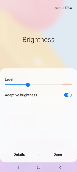Turn on Adaptive brightness and select Done