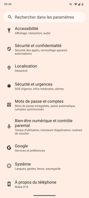 Faites défiler et sélectionnez Systéme