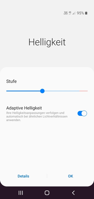 Schalten Sie Adaptive Helligkeit ein und wählen Sie OK