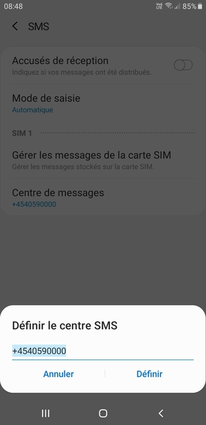 Saisissez le numéro du Centre de messages et sélectionnez Définir