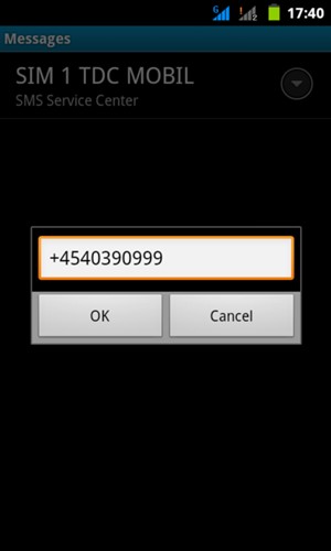 Enter the SMS Service Center number and select OK
