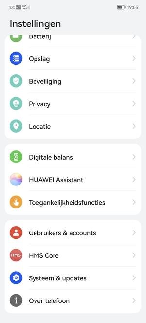 Scroll naar en selecteer Systeem & updates