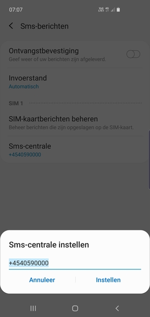 Voer het Sms-centrale nummer in en selecteer Instellen
