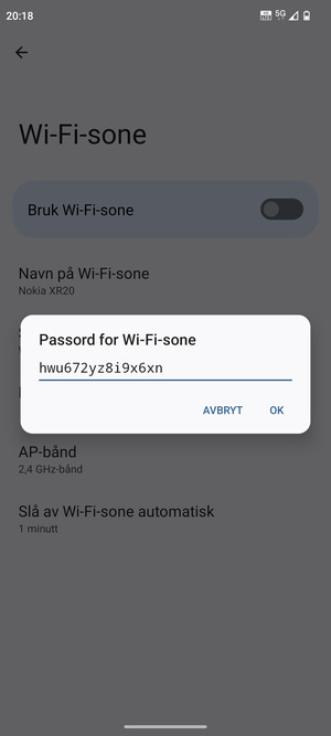 Skriv inn et Wi-Fi hotspot-passord på minst 8 tegn og velg OK
