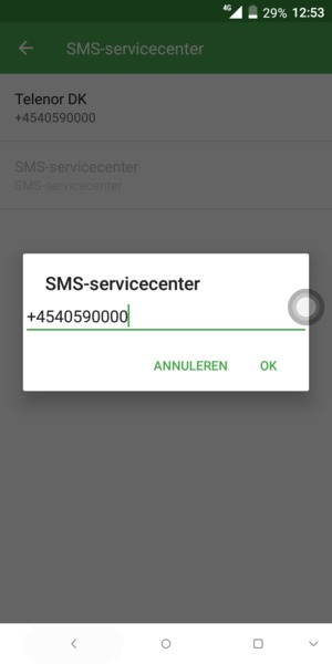 Voer het SMS-servicecenter nummer in en selecteer OK