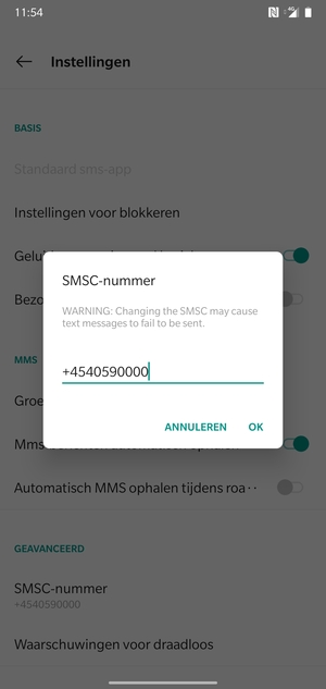 Voer het SMSC-nummer in en selecteer OK