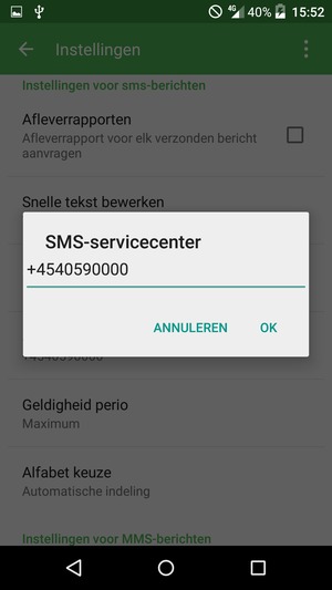Voer het SMS-servicecenter nummer in en selecteer OK