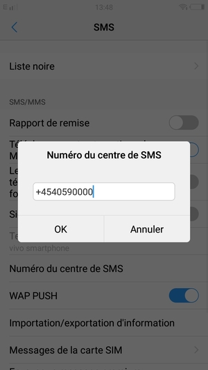 Saisissez le numéro du centre de SMS et sélectionnez OK