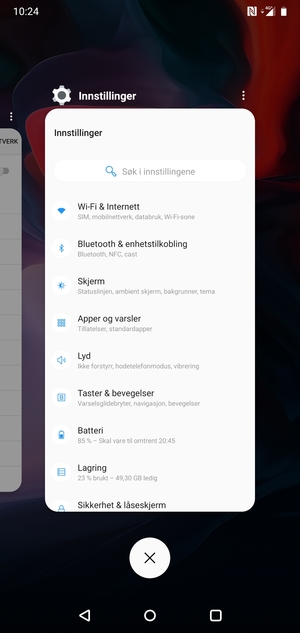 Velg sletteikonet for å lukke alle programmer som kjører