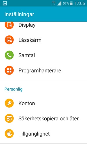 Scrolla till och välj Säkerhetskopiera och åter..