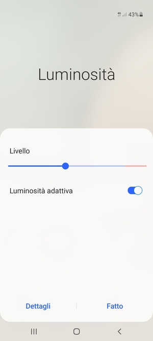 Attiva Luminosità adattiva e seleziona Fatto