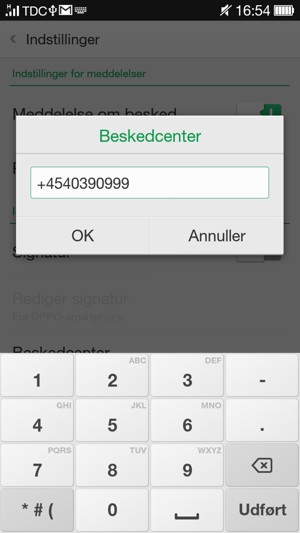 Indtast Beskedcenter nummeret og vælg OK