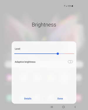 Turn on Adaptive brightness and select Done