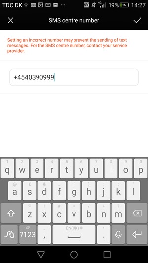Enter the SMS centre number and select OK