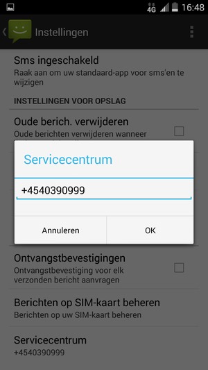 Voer het Servicecentrum nummer in en selecteer OK