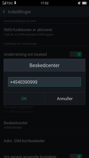 Indtast Beskedcenter nummeret og vælg OK