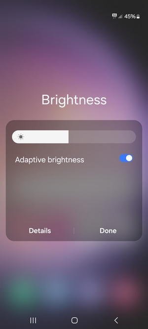 Turn on Adaptive brightness and select Done