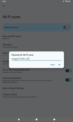 Skriv inn et Wi-Fi hotspot-passord på minst 8 tegn og velg OK