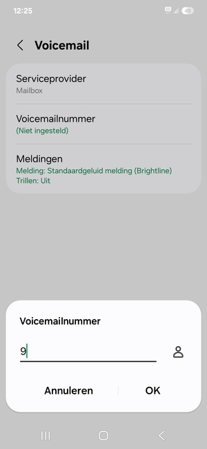 Voer het Voicemailnummer in en selecteer OK