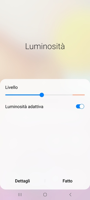 Attiva Luminosità adattiva e seleziona Fatto